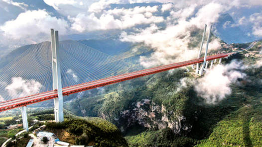 奮進強國路 闊步新征程丨逢山開路遇水架橋 天塹變通途